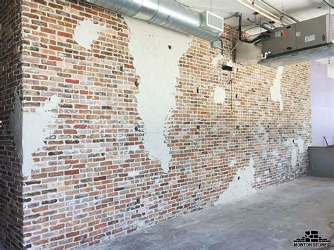 bare brick internal walls.